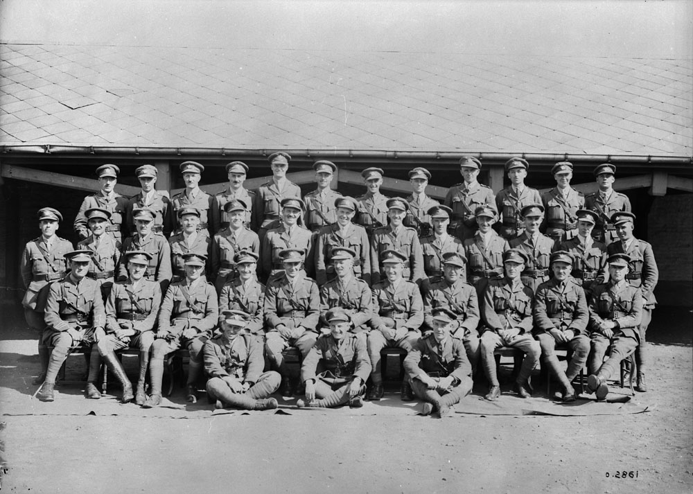 Officers of the 75th Canadian Infantry Battalion. July, 1918. (Front row, L-R): Capt. F.K. Prowse, Lts. H.M. Firstbrook, H.P. Hanan.(Second row, L-R): Maj. W.L. Haynes-Reed, Capts. A.W. Boddy, J. Falkner, W.K. Commins, Maj. A.G. Poupore, Lt. Col. C.C. Harbottle, Capts. A.A. Gray, M.A. Neelon, R.H. Bradfield, T.S. Creswicke, Captain Bellenden Seymour Hutcheson, (Third row, L-R): Lts. G.C. Kearsley, C.F. Swayze, R.T.E. Hicks-Lyne, C.H. Barnes, W. Carlisle, C.U. Haywood, C.G. Weeks, F.B. Walls, F. Scammell, A.A. Kippen, Capt. A.B. Duncan, Lts. I.B. Alkenbrack, W.A. Hoskin. (Rear row, L-R): Lts. A.W. Pike, J. Leonard, W.E. Swan, A.C. Bain, A.A. Bolte, E. Howell, C.C. Henderson, D. Strype, W.E. Walker, B.G. Gray, A.E. Holmes, R.V. Waller. MIKAN No. 3522231