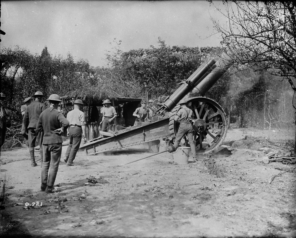 Heavy Howitzer in Action. This photograph shows a BL 60 pounder heavy field gun firing. Possibly Sgt. Francis P. Walshe on day and location he was wounded. 3 September 1916. MIKAN No. 3395179